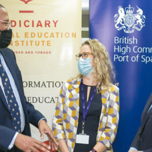 The Hon. the Chief Justice Mr. Justice Ivor Archie chatting with The Hon. Justice GIllian Lucky, JA, Chairman of the JEITT (Right),and Ms. Maia,  Hibben, Criminal Justice Adviser, British High Commission, Port of Spain.